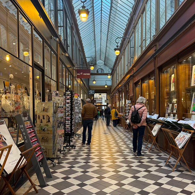 Picture of an indoor street with souvenir stores and items displayed