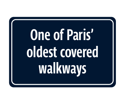Dark blue and white signage behind text